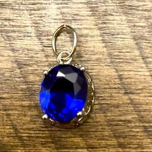 5/$25 silver pendant with blue stone